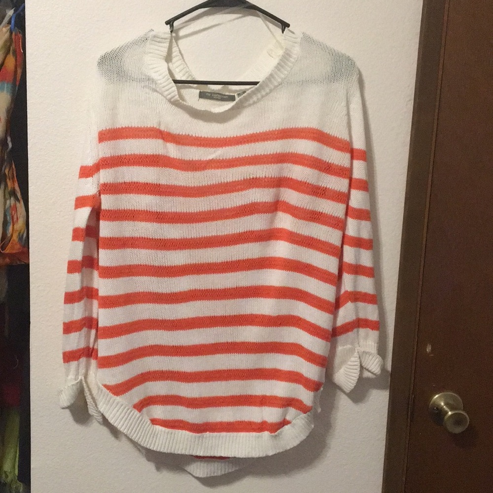 Coral and white sweater